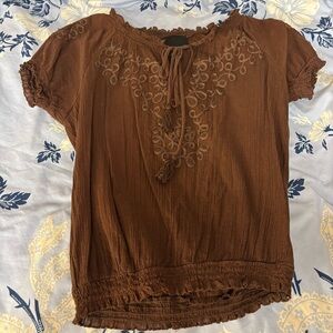 Brown embroidered blouse with tie at front and ruffle trim
